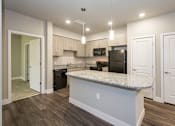 Thumbnail 14 of 16 - Full Kitchen with Granite Countertops at Northgate Colorado Springs Apartments for Rent