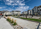 Thumbnail 4 of 16 - Outdoor Games and Bocce Ball Court at Brand New Colorado Springs Apartments Near Me