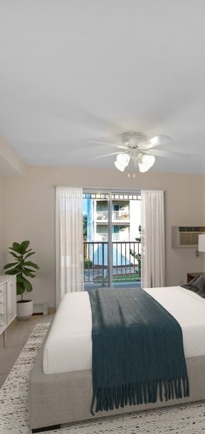 a bedroom with a bed and a ceiling fan