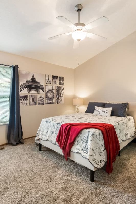 a bedroom with a bed and a ceiling fan at Parkside at Maple Canyon Apartments, Columbus, OH 43229
