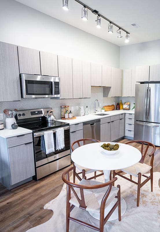 You are now viewing the kitchen and breakfast area in a model apartment  at Grand Flats, St. Louis, 63104