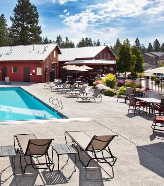 Pine Valley Ranch Apartments Spokane, Washington Pool Area and Lounge Chairs