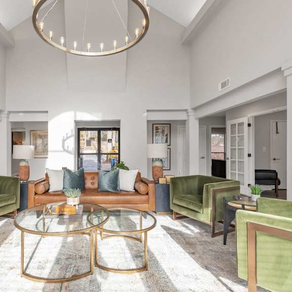 a living room with a fireplace and a couch  at Brampton Moors, Cary, NC