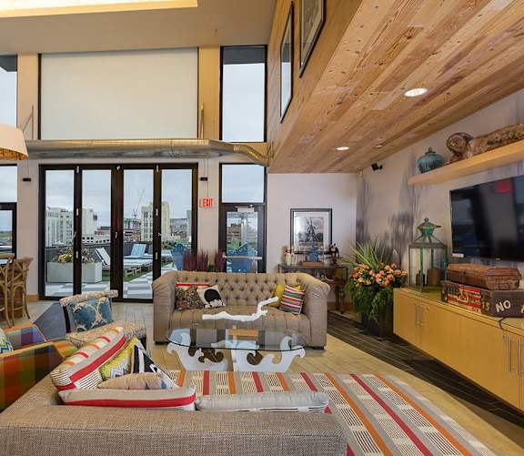 A living room with a couch and a chair.