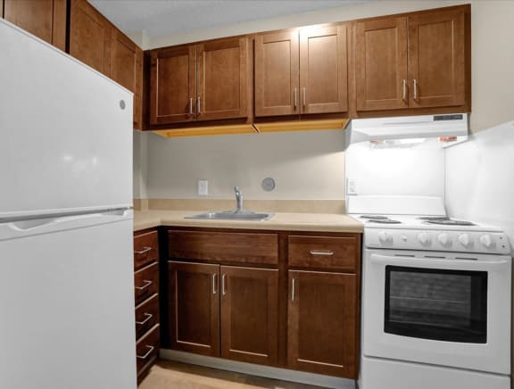 the community room with a TV at Memphis Towers Apartments