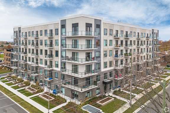 a large apartment building with scaffolding in front of it