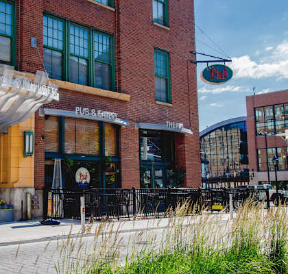 Brick building facade at Harness Factory Lofts, Managed by Buckingham Urban Living, Indianapolis, Indiana