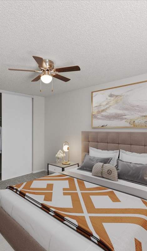 a bedroom with a large bed and a closet