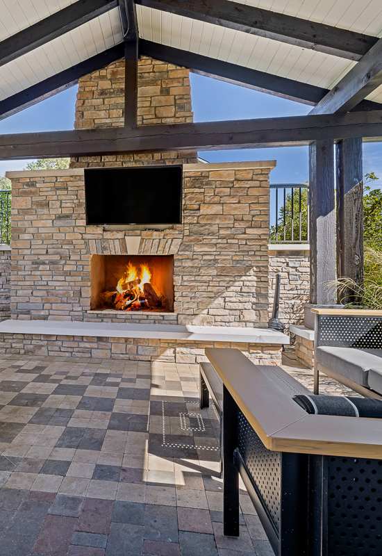 the estates at tanglewood |covered patio with fireplace