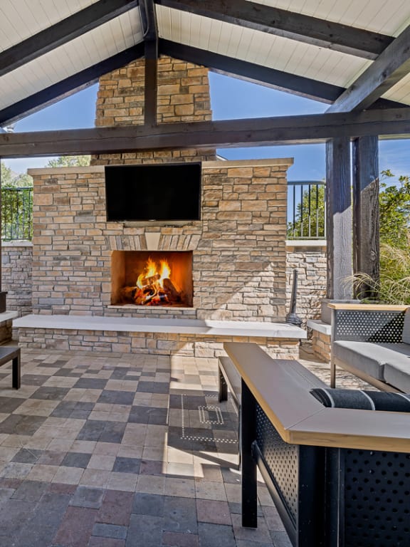 the estates at tanglewood |covered patio with fireplace
