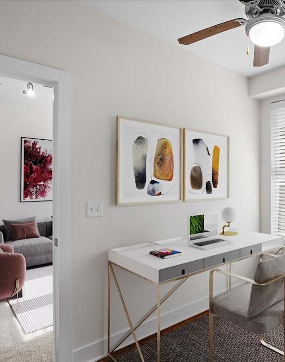 a living room with a large window and a view of a city