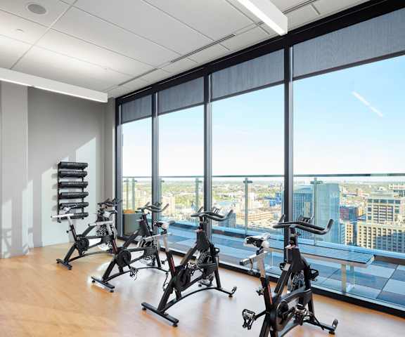 A gym with a view of the city at 4Marq.