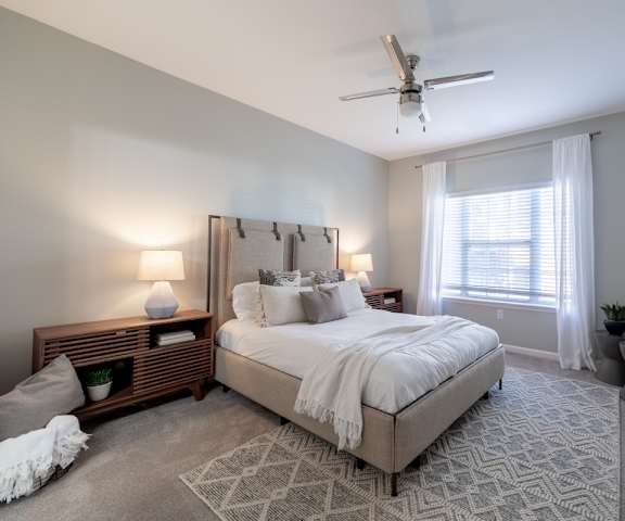 Bright Bedroom with Wide Windows at The Village on Spring Mill, Carmel, IN