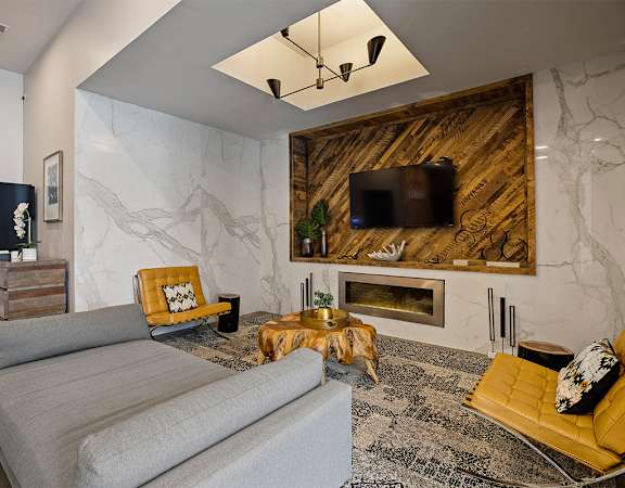 Living room with couch and tv at The Shelby, Chicago, 60616