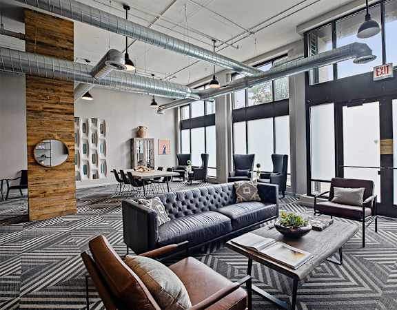 Couch and table in living room at The Shelby, Chicago, 60616