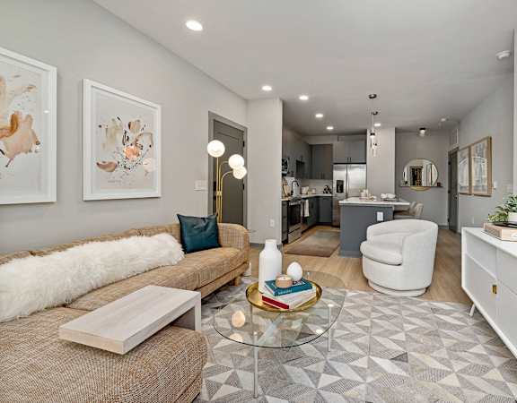 a living room with a couch and a table
