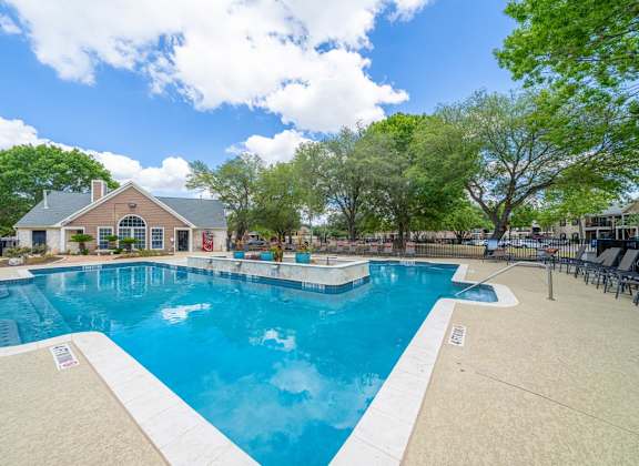 take a dip in the resort style pool at villas at houston levee west apartments