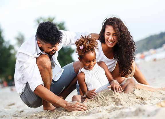 Lifestyle photo of family at the beach at Preserve at Boynton Beach, Boynton Beach