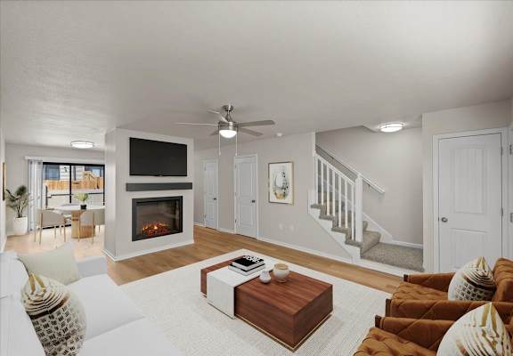 a living room with a couch and a fireplace