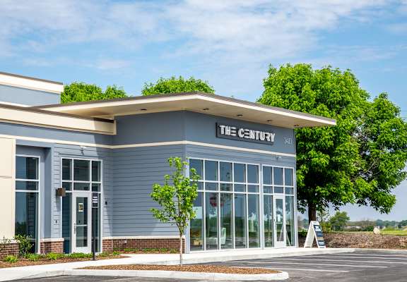 a gray building with glass doors and windows at The Century at Purdue Research Park-Student, West Lafayette