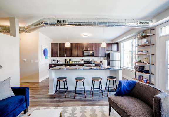 Breakfast bar and kitchen island at The Congress at Library Square, Indianapolis, IN