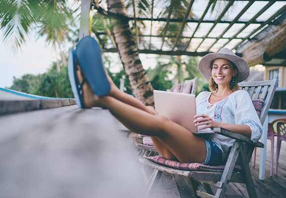 Lifestyle photo of woman working from home at Preserve at Boynton Beach, Boynton Beach