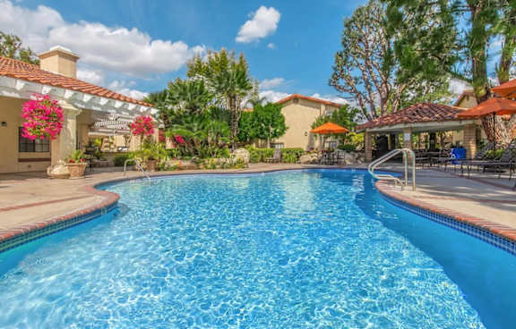 the swimming pool at the resort at turf at Victoria Springs Apartments, California
