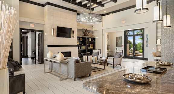 the estates at tanglewood|pool with clubhouse in background at Ovation at Lewisville Apartments, Texas , 75067
