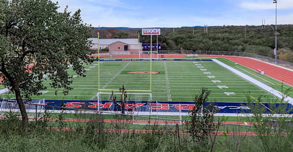 A football field with a scoreboard and goal post.at The Keller, San Antonio, TX 78230
