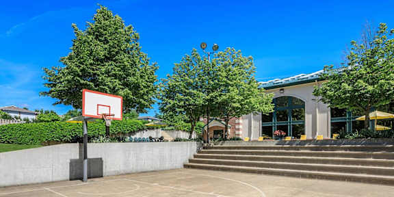 A brick building with the number 305 on it.