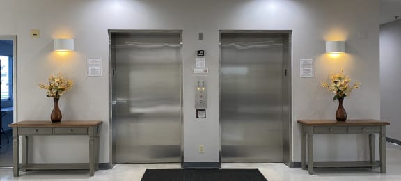 Dual elevators in lobby at Deedco Gardens Senior Apartments
