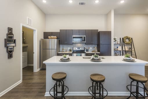 Large Kitchen with Chef Island and Large Counters at Colorado Springs Apartment Near Me
