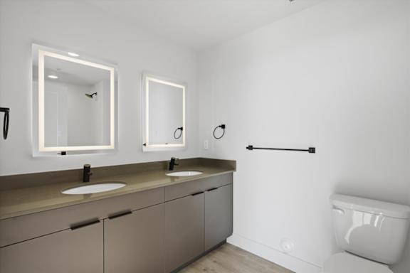 Bathroom with mirrors at Brickside Heights, Millcreek, UT
