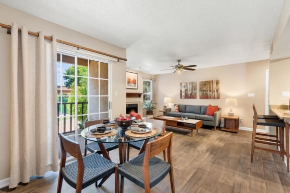 Spacious Apartment Dining Room with Faux Wood Flooring