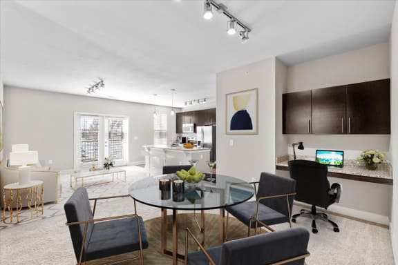 a living room and dining room with a glass table