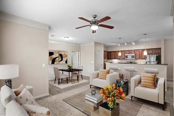 a living room with furniture and a ceiling fan at Stonepost Ranch, Overland Park, KS, 66221