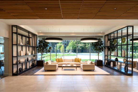 a large living room with a couch and a table at Sinclaire on Seminary, Alexandria, VA 22311