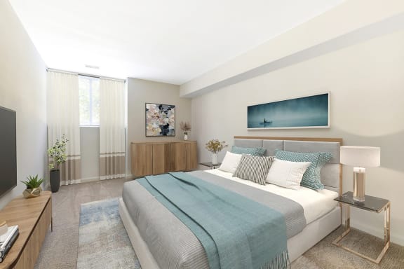 a bedroom with a bed and a tv in a 555 waverly unit at Copper and Quarry Village, Pikesville, MD, 21209
