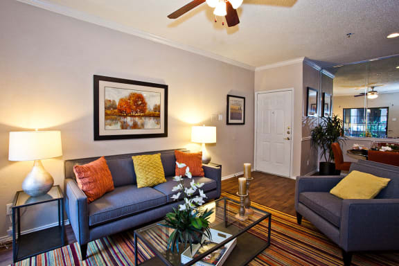 Spacious living room at apartments with elevators