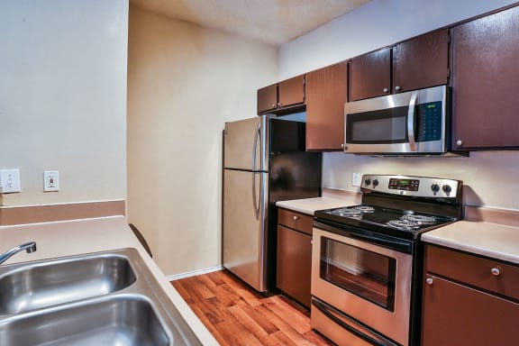 Upgraded kitchen with new appliances at Best apartments in Irving TX