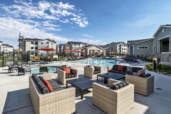 Colorado Springs Apartments Near Lockheed Martin with Outdoor Pool Lounge