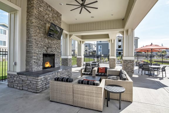Covered Fireside Lounge with Fireplace at Beautiful Apartments for Rent in Colorado Springs