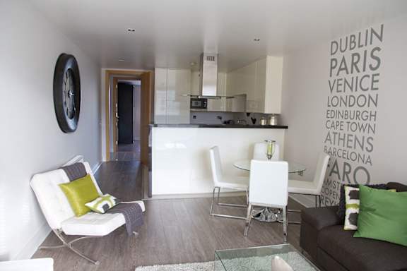 a kitchen and living room with a white