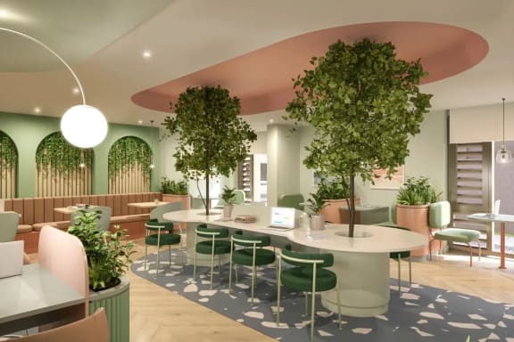 a rendering of a lounge area with tables and chairs and plants