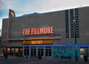 Thumbnail 1 of 9 - a large building with a neon sign that reads the fillmore