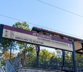 a sign for the allerton outbound to providence train station