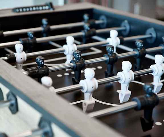 A close up shot of the foosball table. 
