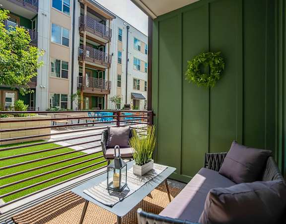 Discovery at the Realm Apartments Patio with Furniture