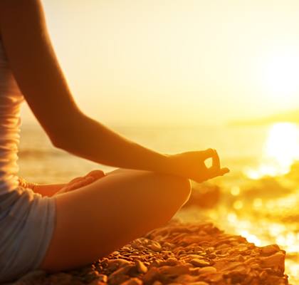Lifestyle photo of woman at the beach meditating at Monterey Pointe, Homestead, FL