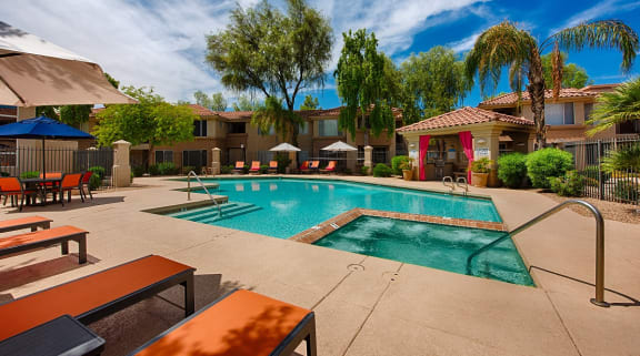 outdoor pool area with sunshine at apartments in mesa arizona